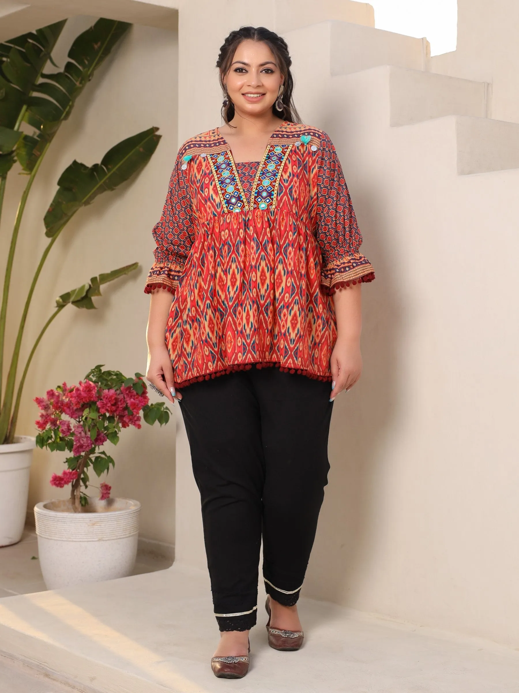 Jashvi Orange Ikat Printed Peplum Cotton Plus Size Tunic With Mirror Work & Lace