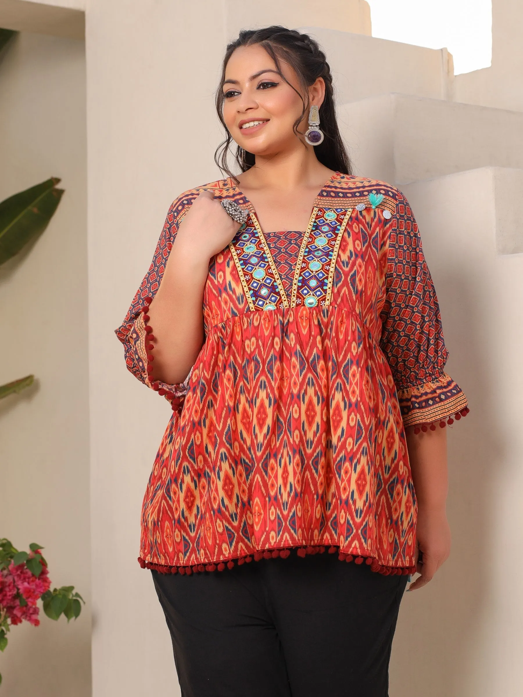 Jashvi Orange Ikat Printed Peplum Cotton Plus Size Tunic With Mirror Work & Lace