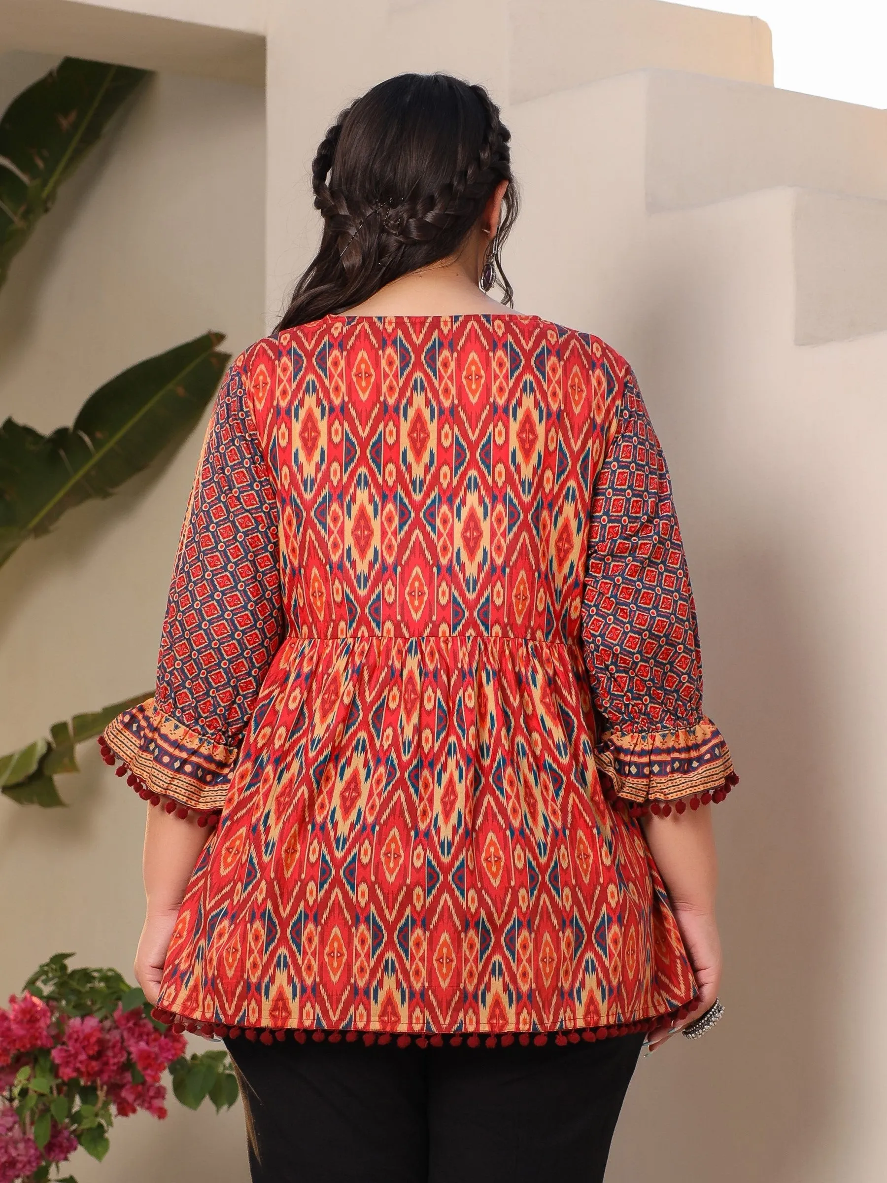 Jashvi Orange Ikat Printed Peplum Cotton Plus Size Tunic With Mirror Work & Lace